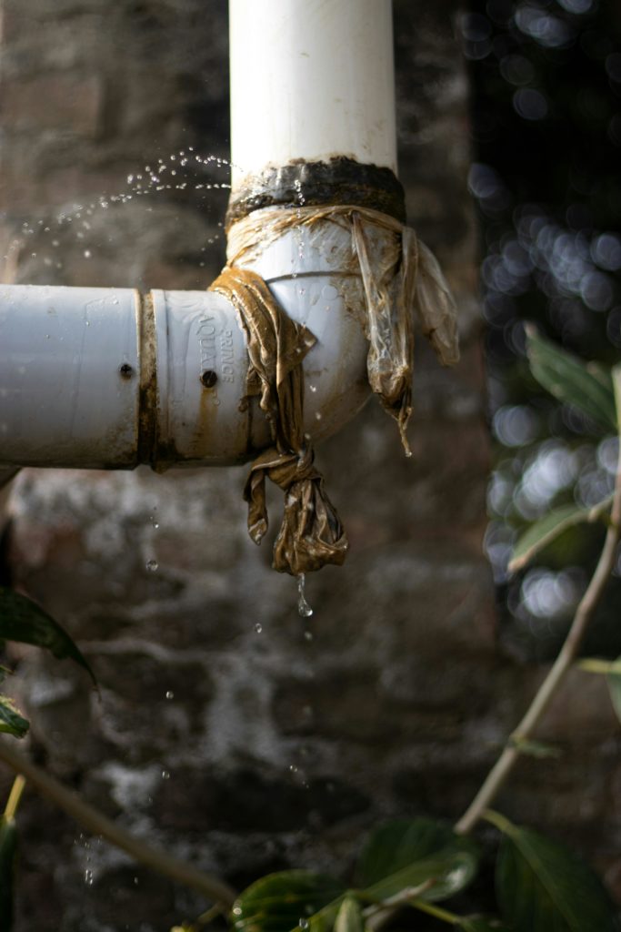 sealing leaking pipe joint modern interior aesthetic professional photography.png