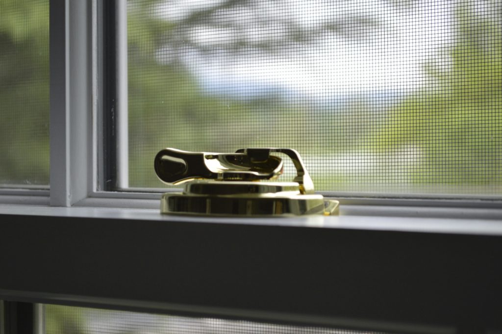 window child safety lock modern interior aesthetic professional photography.webp