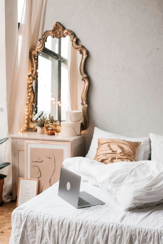 mirrored wall small bedroom modern interior aesthetic professional photography.png