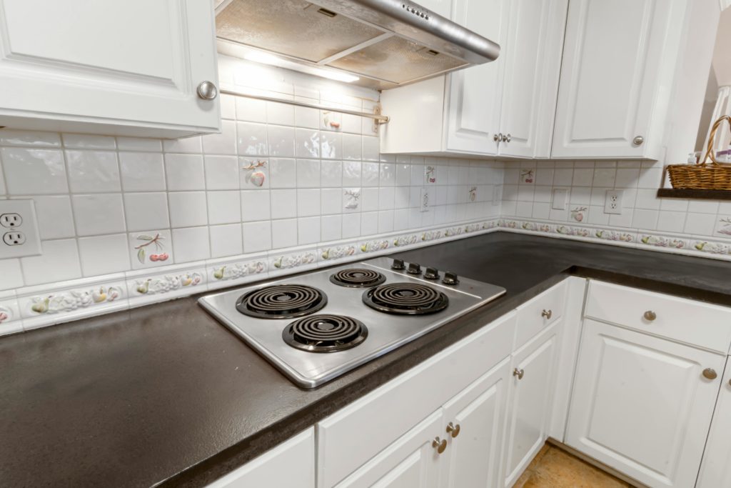 kitchen tile replacement process modern interior aesthetic professional photography.jpg