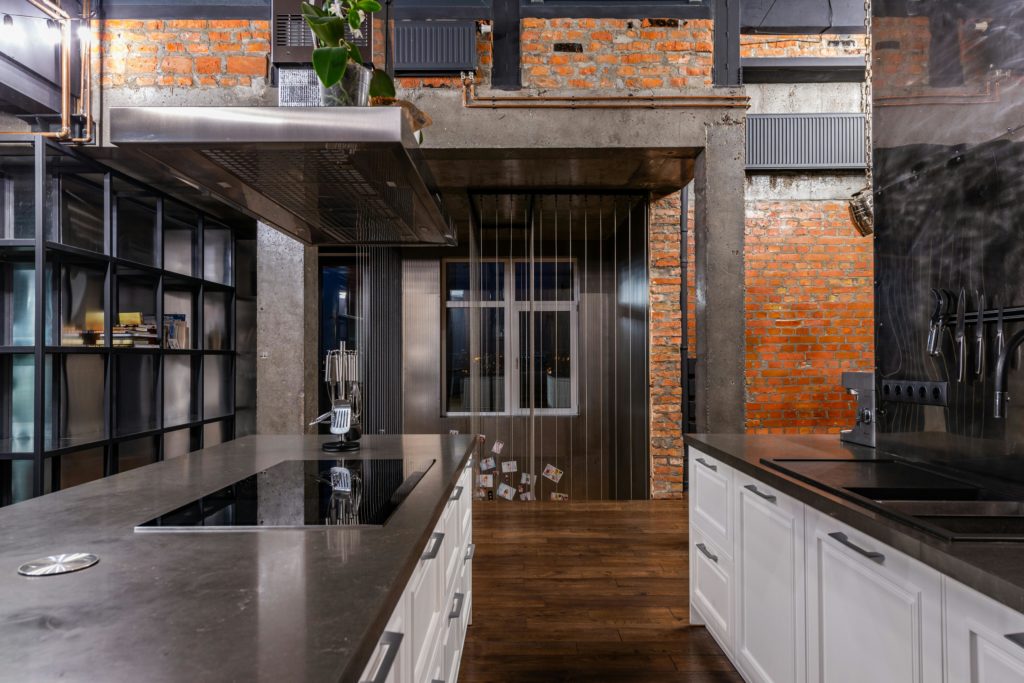 exposed brick wall loft kitchen modern interior aesthetic professional photography.jpg